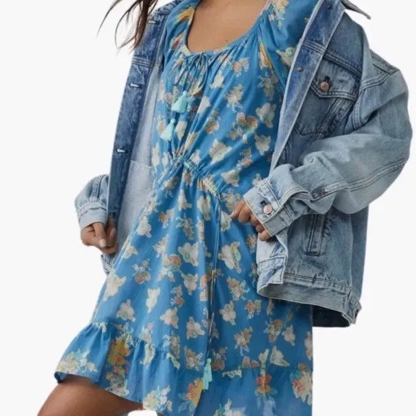 Long sleeved tassel tie ruffled hem mini dress