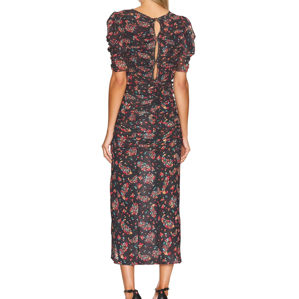 Woman wearing a floral dress on a white background